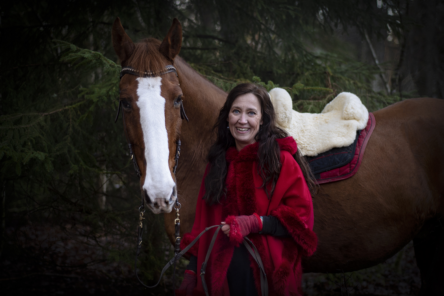 Foto på Anna Hammarström Rex och hennes häst Bianco.